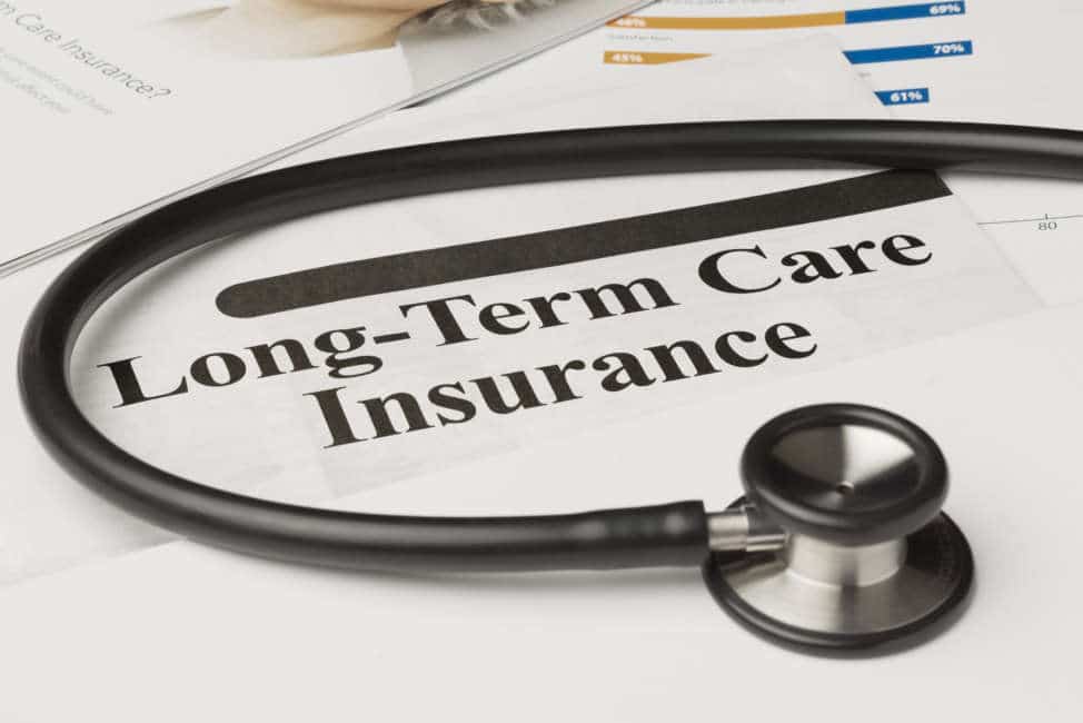 Long-term care insurance information, form and stethoscope.