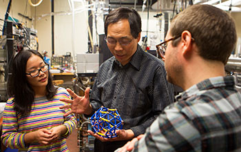 Lai-Sheng Wang (middle), a professor of chemistry at Brown University, and graduate students Wei-Li Li (left) and Zachary Piazza (right). 