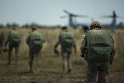 U.S. Army special operations forces walk to a Marine Corps MV-22 Osprey tiltrotor aircraft to conduct a high-altitude, low-opening jump with Philippine and Australian special operations forces May 7, 2014, during Balikatan 2014 at Fort Magsaysay, Philippines. Balikatan is an annual bilateral training exercise designed to increase interoperability between the Armed Forces of the Philippines and the U.S. military when responding to future natural disasters. 

