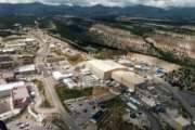 This undated aerial photo shows the Los Alamos National laboratory in Los Alamos, N.M. The federal agency that oversees the nation's nuclear weapons stockpile is expected this week to release a report on the best site option for the United States as it looks to ramp up production of the plutonium cores that trigger nuclear warheads. The contenders are the Los Alamos National Laboratory in New Mexico and the Savannah River Site in South Carolina. At stake are hundreds of jobs and billions of dollars in federal funding to either revamp existing buildings or construct new factories. (The Albuquerque Journal via AP)