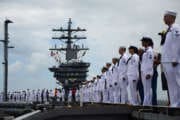 130703-N-XQ474-132
NORFOLK, Va. (Jul. 03, 2013) – Sailors man the rails on the flight deck of the aircraft carrier USS Dwight D. Eisenhower (CVN 69). USS Dwight D. Eisenhower (CVN 69) arrives at Naval Station Norfolk as part of the Eisenhower Carrier Strike Group (IKECSG), following a deployment to support maritime security operations and theater security cooperation efforts in the U.S. 5th and 6th Fleet areas of responsibility. IKCSG is comprised of Carrier Strike Group (CSG) 8, USS Dwight D. Eisenhower (CVN 69), embarked Carrier Air Wing (CVW) 7, embarked Destroyer Squadron (DESRON) 28, and USS Hue City (CG 66). (U.S. Navy photo by Mass Communication Specialist Andrew Schneider/Released)