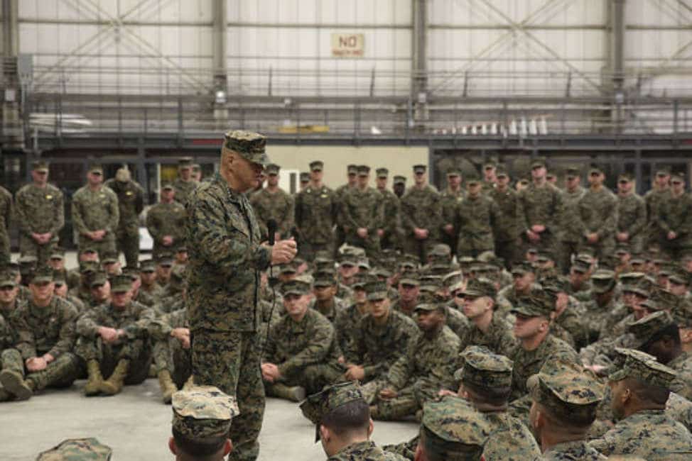 Commandant of the Marine Corps Gen. Robert B. Neller addresses Marines and Sailors assigned to Special Purpose Marine Air-Ground Task Force-Crisis Response-Africa, during a ceremony at Naval Air Station Sigonella, Italy, Dec. 25, 2017. Neller and Sgt. Maj. Ronald L. Green, sergeant major of the Marine Corps stopped by NAS Sigonella to spend time with SPMAGTF-CR-AF service members during the holidays. SPMAGTF-CR-AF is deployed to conduct crisis-response and theater-security operations in Europe and Africa. (U.S. Marine Corps photo by Lance Cpl. Patrick Osino) www.dvids.hub.net
