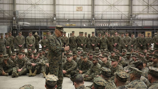 Commandant of the Marine Corps Gen. Robert B. Neller addresses Marines and Sailors assigned to Special Purpose Marine Air-Ground Task Force-Crisis Response-Africa, during a ceremony at Naval Air Station Sigonella, Italy, Dec. 25, 2017. Neller and Sgt. Maj. Ronald L. Green, sergeant major of the Marine Corps stopped by NAS Sigonella to spend time with SPMAGTF-CR-AF service members during the holidays. SPMAGTF-CR-AF is deployed to conduct crisis-response and theater-security operations in Europe and Africa. (U.S. Marine Corps photo by Lance Cpl. Patrick Osino) www.dvids.hub.net
