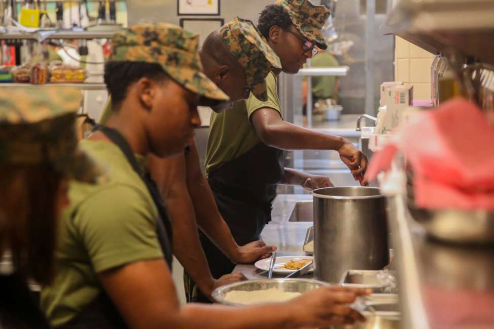 Lance Cpl. Lydia Gulley, a Marine with Marine Wing Support Squadron 271, applies the skills taught about cooking quickly at Mess Hall 128 on Marine Corps Base Camp Lejeune, Sept. 22. The Sodexo Company Quality of Life Services teaches methods to Marine food service specialist to improve the basic services to include stir fry cooking, steaming, boiling, sautéing, roasting, braising, stewing and knife skills. (U.S. Marine Corps photo by Lance Cpl. Tavarius Hernandez)