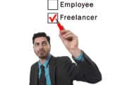 businessman choosing freelancer to employee option at work formular ticking box with red marker on glass isolated on white in self employment versus company salary and freelance working concept