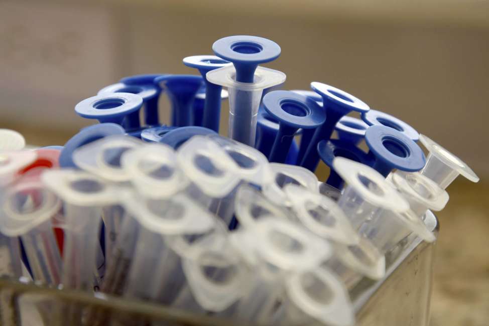 In this Monday, April 23, 2018, photo, syringes used to administer CBD oil sit on the kitchen counter of the Inman family in Colorado Springs, Colo. Lukas Inman, 19, suffers from a rare and severe form of epilepsy called Lennox-Gastaut Syndrome. The Inmans moved from Maryland to Colorado in 2015 after doctors recommended a second brain surgery for Lukas’ seizures. Luke's and other parents and advocates for cannabidiol, CBD, said children respond differently to a variety of strains. (AP Photo/Thomas Peipert)