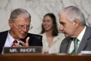 Sen. Jim Inhofe, R-Okla., left, speaks with Senate Armed Services Committee Ranking Member Sen. Jack Reed, D-R.I., during a committee hearing with Defense Secretary Jim Mattis on the Department of Defense budget posture, Thursday April 26, 2018, on Capitol Hill in Washington. 