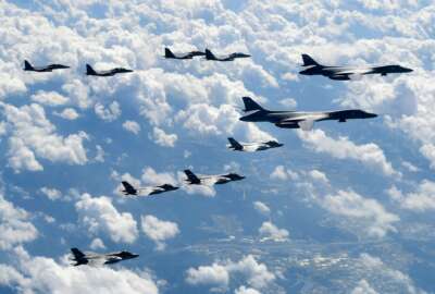FILE - In this Sept. 18, 2017, file photo provided by South Korea Defense Ministry, U.S. Air Force B-1B bombers, F-35B stealth fighter jets and South Korean F-15K fighter jets fly over the Korean Peninsula during a joint drills. U.S. President Donald Trump promised to end “war games” with South Korea, calling them provocative, after meeting North Korean leader Kim Jong Un on June 12, 2018. His announcement appeared to catch both South Korea and the Pentagon by surprise. (South Korea Defense Ministry via AP, File)