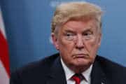 President Donald Trump listens during a meeting with French President Emmanuel Macron during the G-7 summit, Friday, June 8, 2018, in Charlevoix, Canada. (AP Photo/Evan Vucci)