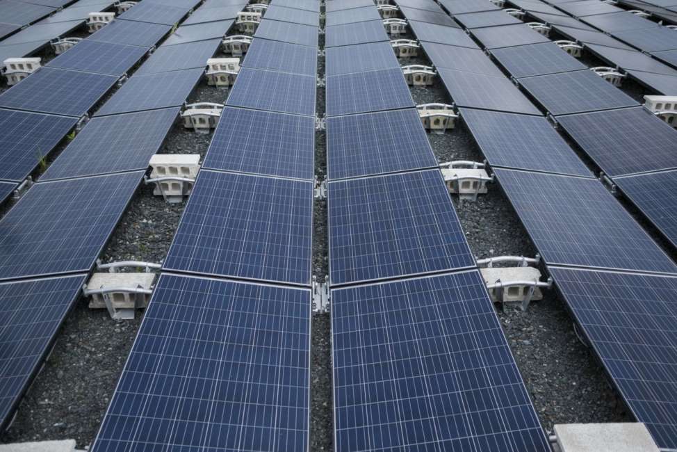 In this July 20 photo, solar panels installed by Tesla, power a community of 12 homes in the mountain town of Las Piedras, Puerto Rico. The homes still do not have power from the national grid, more than 10 months after Hurricane Maria and now is operating exclusively on solar energy. (AP Photo/ Dennis M. Rivera Pichardo)