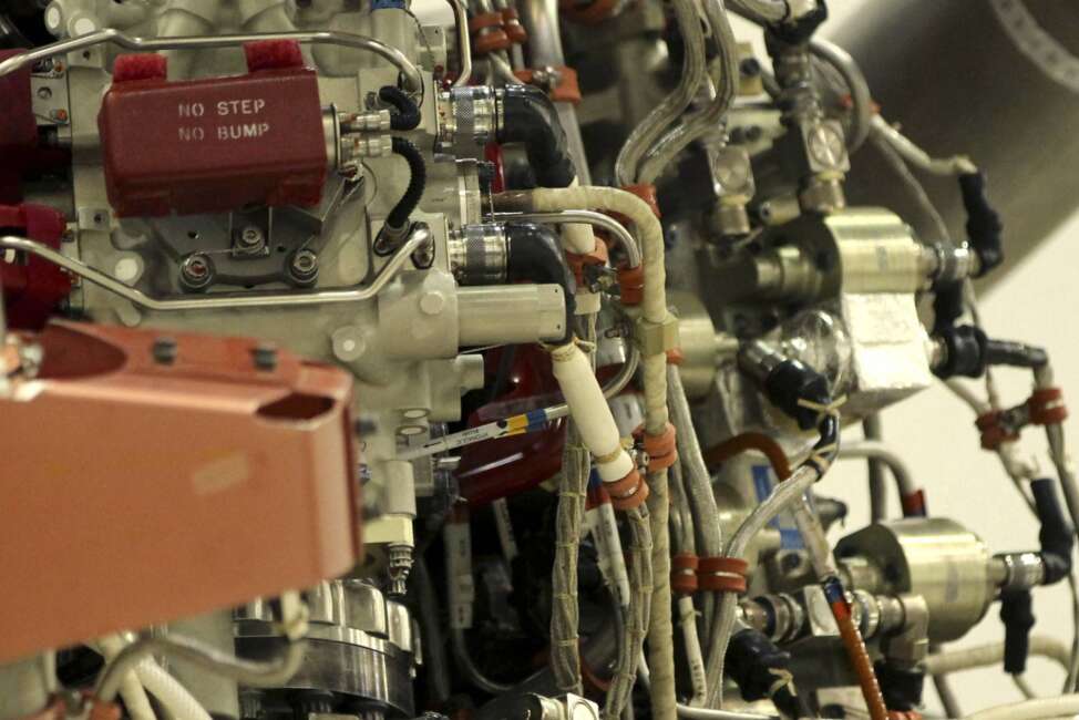 A detail of some of the complexity of the AR-22 engine, being used for a developmental reusable spacecraft, is seen in Stennis, Miss., Monday, July 2, 2018. Triggering a massive cloud of vapor and a roar, officials on Monday test fired the rocket engine designed to be part of a reusable spacecraft that can launch into space repeatedly with a quick turnaround time. (AP Photo/Gerald Herbert)