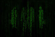 Silhouette of businessmans who is appeared through the matrix background