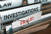 3D illustration of private investigator files with the words investigation and fraud