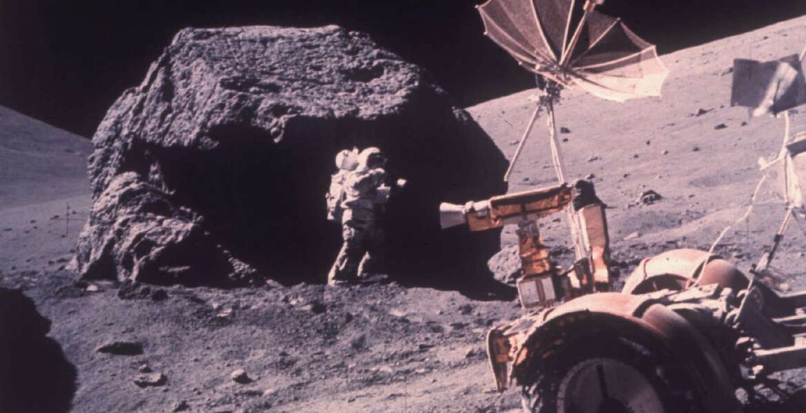 Scientist-Astronaut Harrison H. Schmitt is photographed working beside a huge boulder at Station 6 during the third Apollo 17 extravehicular activity at the Taurus-Littrow landing site, Dec. 13, 1972. (AP Photo/NASA)