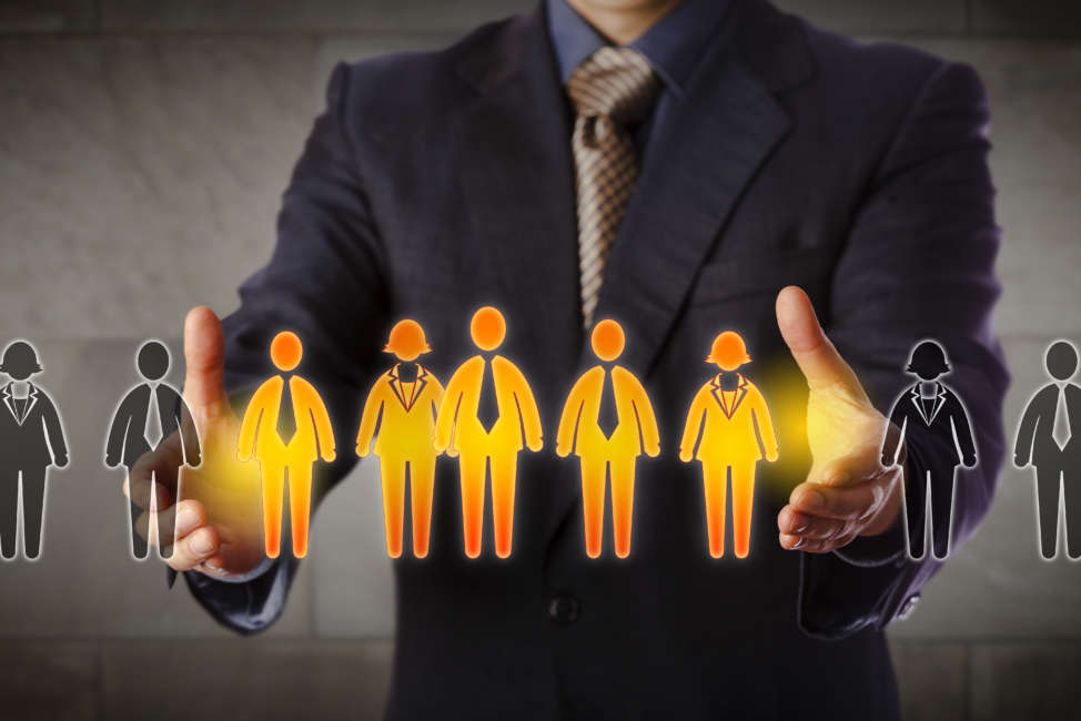 Blue chip recruitment manager selecting a group of five employees in a lineup of worker icons. Business concept for team building, customer segmentation and management succession. Wide composition.