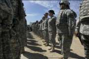 FILE - This Aug. 18, 2010, file photo shows California National Guard troops, who are part of Task Force Sierra, deployed at the border along with Border Patrol Agents near the California/Mexico border in San Diego. California Gov. Jerry Brown on Friday, Sept. 28, 2018, extended the state National Guard's participation in President Donald Trump's border deployment by six months, a low-key announcement that was made without any of the acrimony that characterized his early negotiations with the federal government. The California National Guard said in a press release that the mission will now run until the end of March 2019.  (John Gibbins/The San Diego Union-Tribune via AP, File)