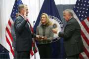 Daniel Smith, left, is sworn in as director of the Foreign Service Institute at the State Department on Oct. 26, 2018, by Deputy Secretary of State John Sullivan