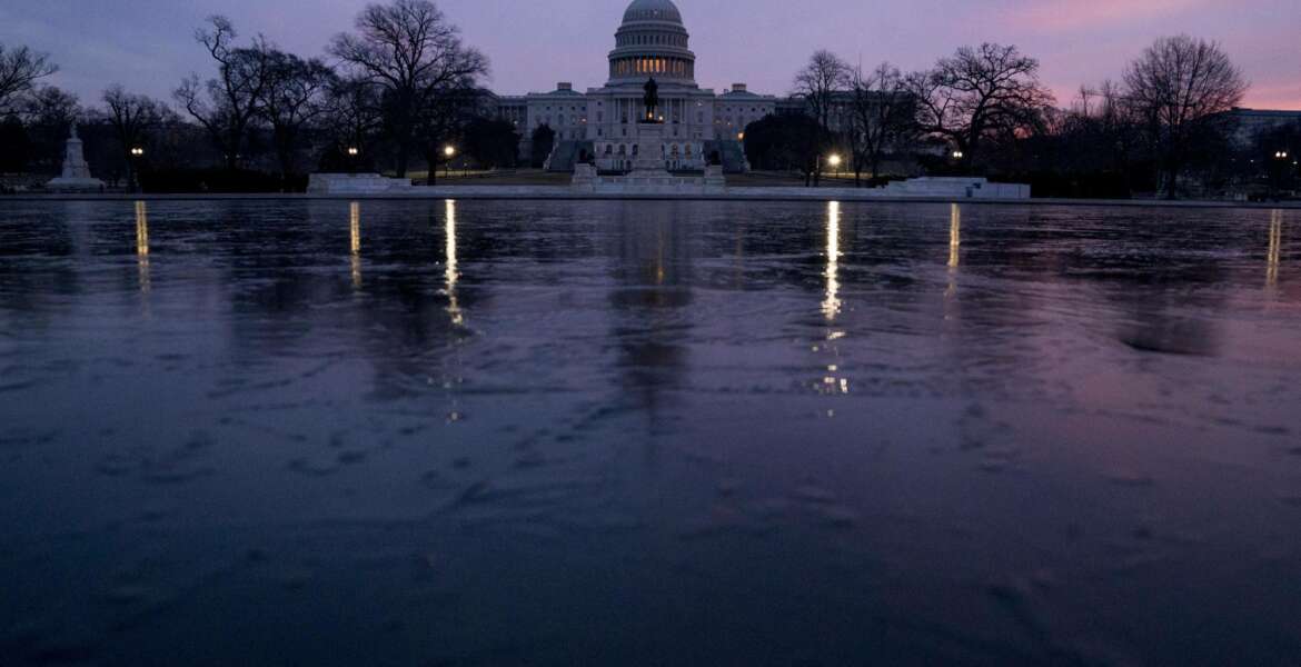 FILE - This Feb. 9, 2018, file photo shows the Capitol Dome of the Capitol Building at sunrise in Washington. The federal budget deficit has surged to $779 billion in fiscal 2018, its highest level in six years as President Donald Trump's tax cuts caused the government to borrow more heavily in order to cover its spending. The Treasury Department said Monday, Oc. 15, that the deficit climbed $113 billion from fiscal 2017. (AP Photo/Andrew Harnik, File)