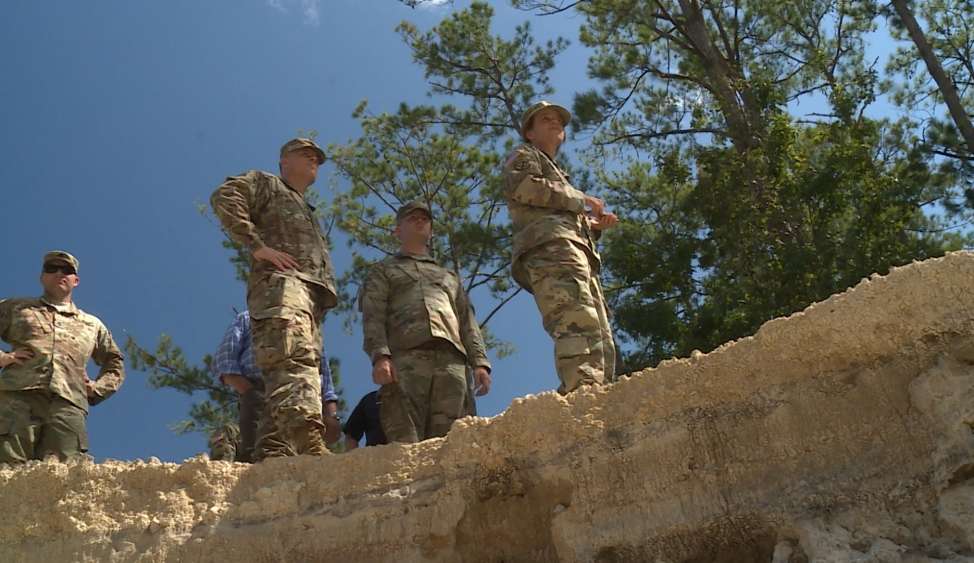 Brig. Gen. Diana Holland, commander, U.S. Army Corps of Engineers - South Atlantic Division, visits with Soldiers from the 27th Engineer Brigade , Sunday Sept. 24, who are making repairs on the Military Ocean Terminal Sunny Point (MOTSU), N.C. MOTSU received some damage to various parts of its infrastructure (roads, bridges and rail) when Hurricane Florence hit the installation. As the U.S. military's largest ammunition terminal, MOTSU serves as a transfer point between rail, trucks, and ships for the import and export of ammunition, explosives and military equipment for the DoD.