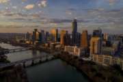 FILE - This Feb. 7, 2018, file photo shows the skyline in Austin, Texas. For more than a year, cities around the country, including Austin, waited in suspense over whether they'd be chosen as Amazon's second home. On Tuesday, Nov. 13, Amazon announced that it had picked for its new East Coast headquarters the New York neighborhood of Long Island City, Queens as well as a suburb of Washington, in Arlington, Va. (Jay Janner/Austin American-Statesman via AP, File)