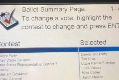 This Oct. 22, 2018, photo shows the ballot summary page of voter Leah McElrath, where although she voted a straight-Democratic Party ticket, the voting machine flipped her vote for United States Senator to Republican Ted Cruz. McElrath and some other Texas voters reported voting machines flipped their straight-ticket selections to the other party in key races during early voting. (Leah McElrath via AP)