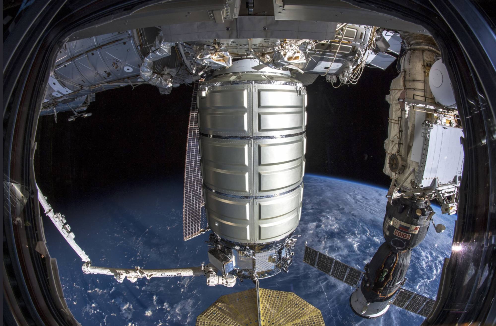 In this image provided by NASA, a commercial shipment arrives at the International Space Station on Monday, Nov. 19, 2018. Astronaut Serena Aunon-Chancellor used the space station’s robot arm to grab Northrop Grumman’s capsule. It’s named after Apollo 16 moonwalker and the first space shuttle commander John Young, who died in January. (Alexander Gerst/European Space Agency, NASA via AP)