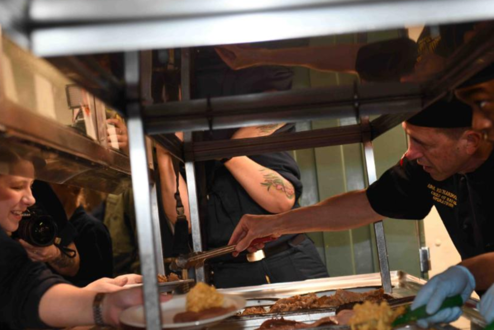 Crew eat Thanksgiving dinner on board the USS Harry S Truman Nov. 22, 2018.