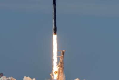 In this photo provided by the U.S. Air Force, a SpaceX Falcon 9 rocket, carrying the Spaceflight SSO-A: SmallSat Express, launches from Space Launch Complex-4E at Vandenberg Air Force Base, Calif., Monday, Dec. 3, 2018. The SpaceX rocket carrying 64 small satellites, marks the first time the same Falcon 9 rocket has been used in three space missions. (Senior Airman Clayton Wear/U.S. Air Force via AP)