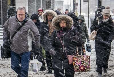 Morning commuters face a tough slog on Wacker Drive in Chicago, Monday, Jan. 28, 2019. (Rich Hein/Chicago Sun-Times via AP)