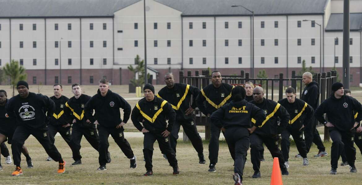 In this photo taken Tuesday, Jan. 8, 2019, U.S Army troops training to serve as instructors participate in the new Army combat fitness test at the 108th Air Defense Artillery Brigade compound at Fort Bragg, N.C. The Army National Guard is looking for nearly 5,000 fitness instructors and buying roughly $40 million in workout equipment in the next seven months to help its soldiers meet new physical fitness standards being set by the military service. (AP Photo/Gerry Broome)