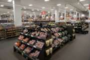 FILE- This April 30, 2018, file photo shows an interior view of the Sainsbury's flagship store in the Nine Elms area of London. British regulators say the proposed supermarkets merger between Sainsbury's and Walmart's Asda unit would push up prices and reduce quality for shoppers, casting doubt on a deal that would create the country's biggest grocery chain. (AP Photo/Matt Dunham, File)