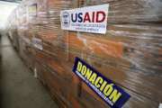 USAID humanitarian aid is stored at a warehouse next to the Tienditas International Bridge on the outskirts of Cucuta, Colombia, on the border with Venezuela, Tuesday, Feb. 19, 2019. The U.S. military airlifted tons of humanitarian aid as part of an effort meant to undermine socialist President Nicolas Maduro and back his rival for the leadership of the South American nation. (AP Photo/Fernando Vergara)