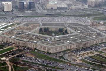 FILE - This March 27, 2008, file aerial photo shows the Pentagon in Washington. The U.S. military wants to expand its use of artificial intelligence in warfare but says it will take care to deploy the technology in accordance with the nation’s values. The Pentagon outlined its first AI strategy on Tuesday, Feb. 12, 2019. (AP Photo/Charles Dharapak, File)