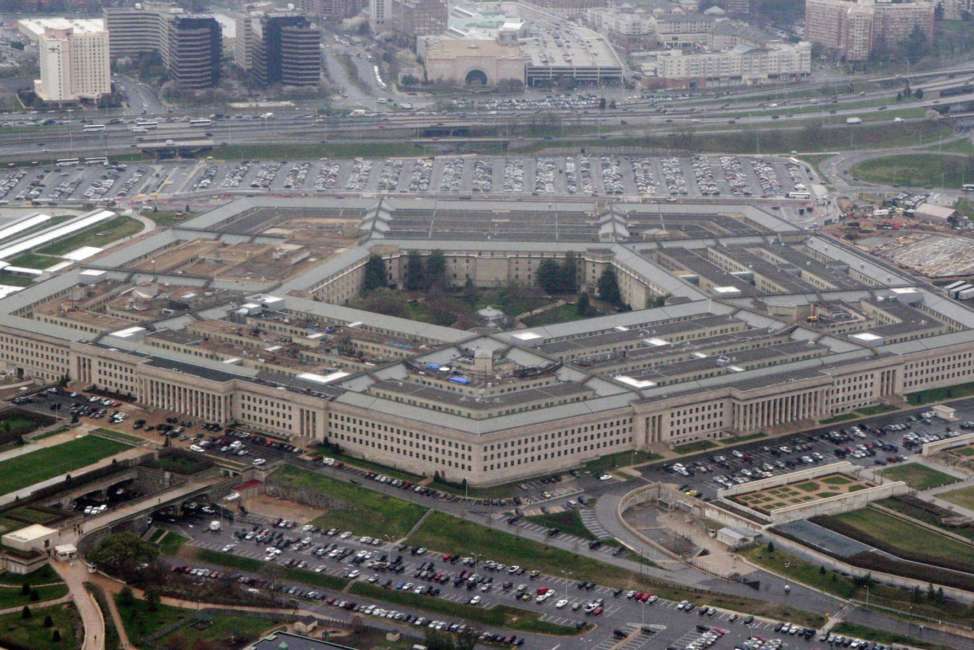 FILE - This March 27, 2008, file aerial photo shows the Pentagon in Washington. The U.S. military wants to expand its use of artificial intelligence in warfare but says it will take care to deploy the technology in accordance with the nation’s values. The Pentagon outlined its first AI strategy on Tuesday, Feb. 12, 2019. (AP Photo/Charles Dharapak, File)