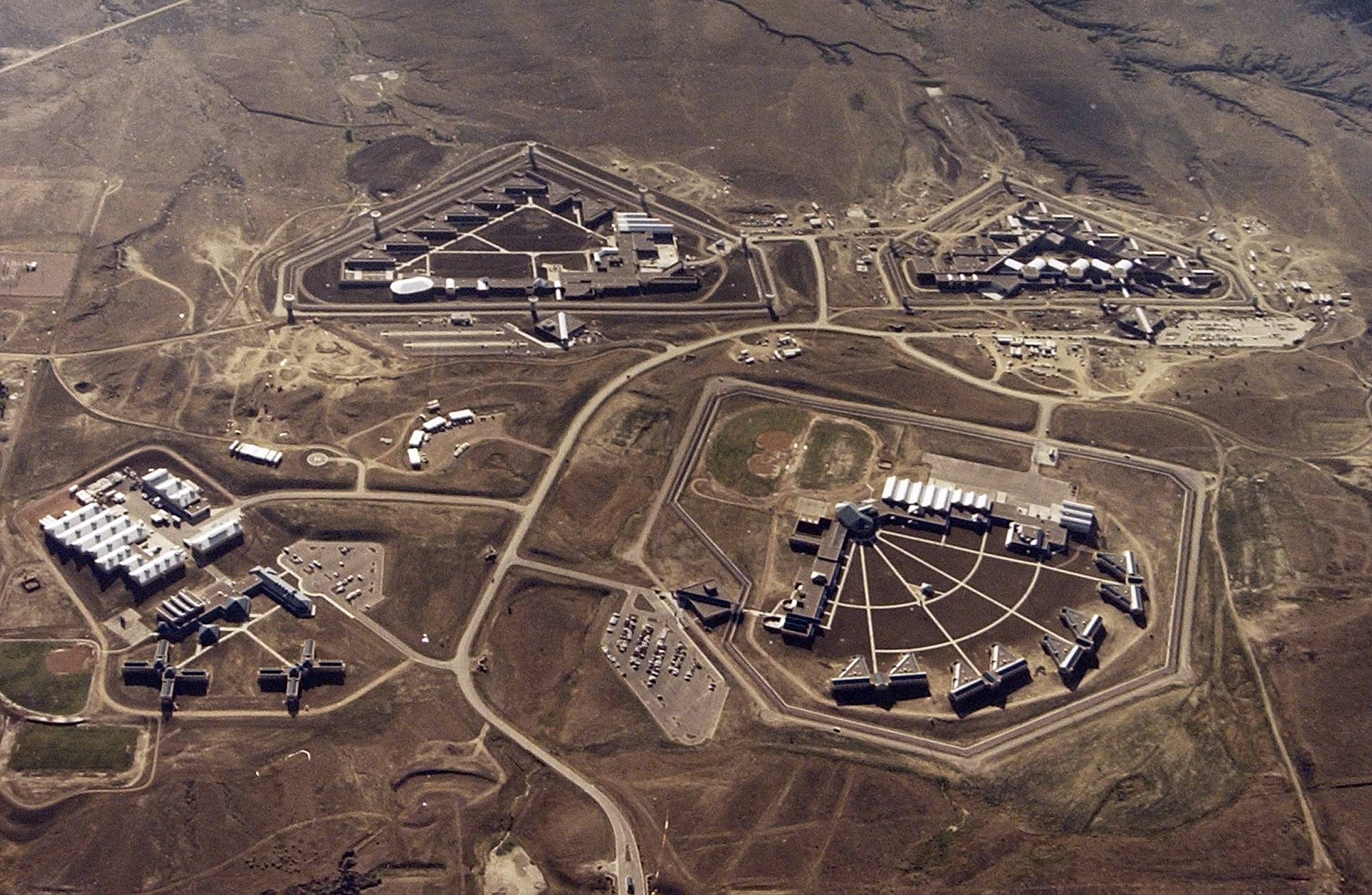 FILE - This Feb. 11, 2004, file photo provided by the Bureau of Prisons shows the Federal Correctional Complex in Florence, Colo. Clockwise from lower left is the minimum security Federal Prison Camp, the high security United States Penitentiary, the maximum security United States Penitentiary and the Federal Correctional Institution. Experts say the drug lord Joaquin 