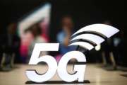 A banner of the 5G network is displayed during the Mobile World Congress wireless show, in Barcelona, Spain, Monday, Feb. 25, 2019. The annual Mobile World Congress (MWC) runs from 25-28 February in Barcelona, where companies from all over the world gather to share new products. (AP Photo/Manu Fernandez)