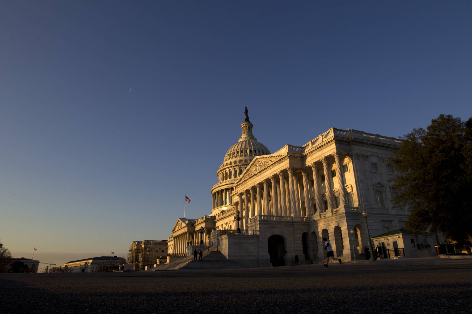The U.S. Capitol is seen during a sunrise in Washington, Wednesday Feb. 27, 2019. Michael Cohen, President Donald Trump's former personal lawyer, will testify today before the House Oversight and Reform Committee in an open hearing. (AP Photo/Jose Luis Magana)