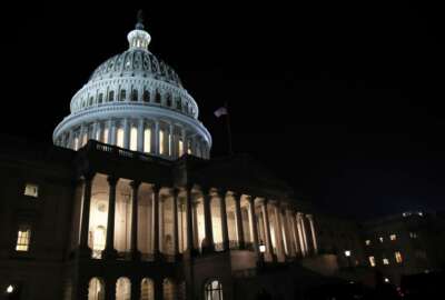 FILE- In this Feb. 5, 2019, file photo lights illuminate the U.S. Capitol dome in Washington. On Thursday, Feb. 14, the Labor Department reports on the number of people who applied for unemployment benefits last week. (AP Photo/Manuel Balce Ceneta, File)