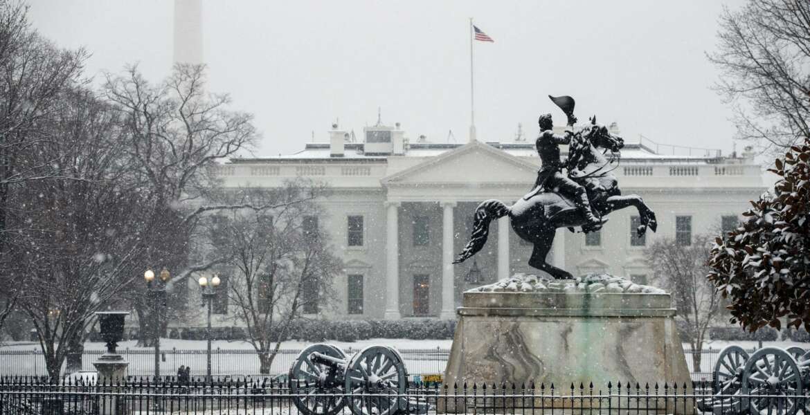 Snow falls on the White House during a winter storm, Wednesday, Feb. 20, 2019, in Washington. (AP Photo/ Evan Vucci)