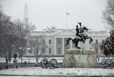 Snow falls on the White House during a winter storm, Wednesday, Feb. 20, 2019, in Washington. (AP Photo/ Evan Vucci)