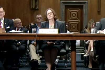 From left, Dennis Kirk, Julia Clark and Andrew Maunz Merit Systems Protection board nominees Senate hearing