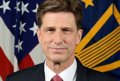 Dana Deasy Department of Defense, Chief Information Officer, poses for his official portrait in the Army portrait studio at the Pentagon in Arlington, Virginia, May 07, 2018.  (U.S. Army photo by William Pratt)