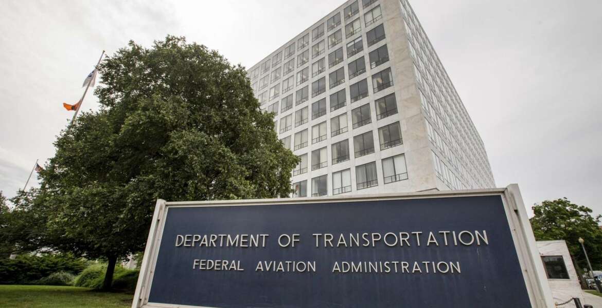 FILE - This June 19, 2015, file photo, shows the Department of Transportation Federal Aviation Administration building in Washington. America's standing as the model for aviation-safety regulation will be on trial as congressional hearings begin Wednesday, March 27, 2019, into the Federal Aviation Administration's oversight of Boeing before and after two deadly crashes of its best-selling airliner. (AP Photo/Andrew Harnik, File)