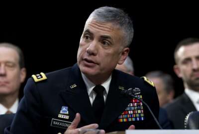 FILE - In this Jan. 29, 2019, file photo, National Security Agency director and head of U.S. Cyber Command Gen. Paul Nakasone testifies before the Senate Intelligence Committee on Capitol Hill in Washington. Nakasone says the military learned a lot as it worked with other government agencies to thwart Russian interference in the 2018 midterm elections. He says the focus has turned to the next election cycle. (AP Photo/Jose Luis Magana, File)
