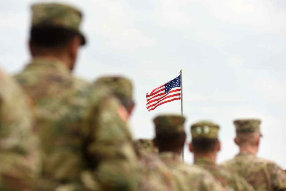 American Soldiers and US Flag. US troops