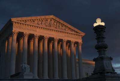 FILE - In this Jan. 24, 2019, file photo, the Supreme Court is seen at sunset in Washington. Vast changes in America and technology have dramatically altered how the census is conducted. But the accuracy of the once-a-decade population count is at the heart of the Supreme Court case over the Trump administration’s effort to add a citizenship question to the 2020 census. The justices hear arguments in the case Tuesday, April 23. (AP Photo/J. Scott Applewhite, File)