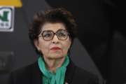 Jovita Carranza, current treasurer at the Department of the Treasury, listens during an event at Nuss Truck and Equipment in Burnsville, Minn., Monday, April 15, 2019, with President Donald Trump. Trump said he intends to nominate Jovita Carranza to lead the Small Business Administration. (AP Photo/Susan Walsh)