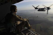 A U.S. Air Force CV-22 Osprey assigned to the 352nd Special Operations Wing, RAF Mildenhall, U.K., performs a flyover during the Mi Amigo 75th anniversary flypast event at Endcliffe Park, Sheffield, U.K., Feb. 22, 2019. The aircraft flew over the park where thousands of U.K. residents honored the memory of the ten fallen U.S. Airmen who died when their war-crippled B-17 Flying Fortress crash landed to avoid killing residents and nearby children. (U.S. Air Force photo by Airman 1st Class Jennifer Zima)