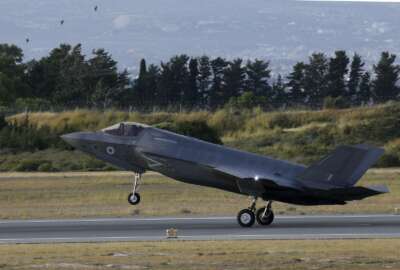 FILE - In this Tuesday, May 21, 2019 file photo, a F-35B aircraft lands at Akrotiri Royal air forces base near coastal city of Limassol, Cyprus. Britain's defense secretary said the country's most advanced military aircraft, the Lightning F-35B, that is undergoing training at a British air base in Cyprus has flown its first missions over Syria and Iraq as part of the ongoing operations against the Islamic State group, in a statement issued Tuesday June 25, 2019. (AP Photo/Petros Karadjias, File)