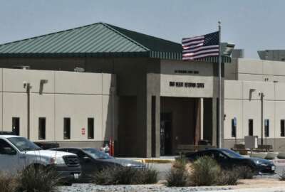 FILE - This April 20, 2019, photo shows the Adelanto Detention Center in Adelanto, Calif., a desert community northeast of Los Angeles. The Homeland Security Department's internal watchdog says rotting food, moldy and dilapidated bathrooms and agency practices at immigration detention facilities may violate detainees' rights. In the Adelanto detention facility, inspectors found nooses in detainee cells, the segregation of certain detainees in an overly restrictive way and inadequate medical care, the report said. (AP Photo/Richard Vogel)